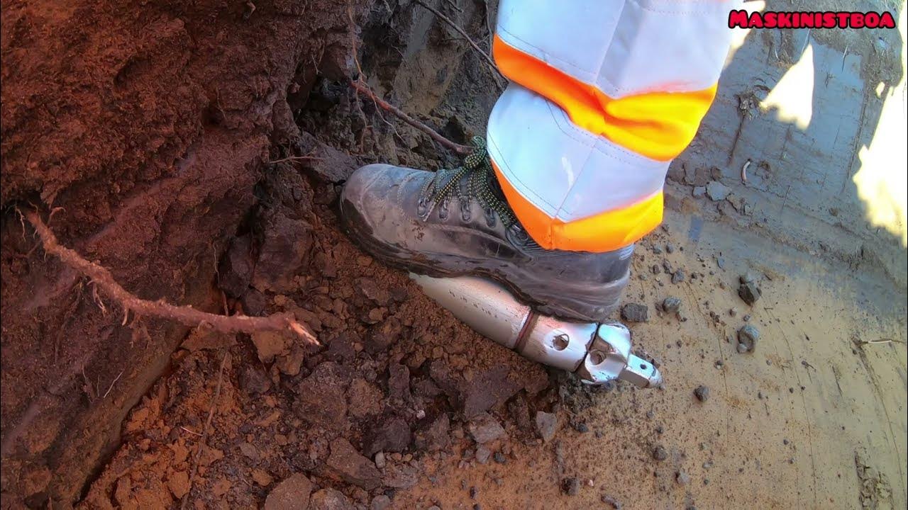 Pushing pipes under the road. YouTube