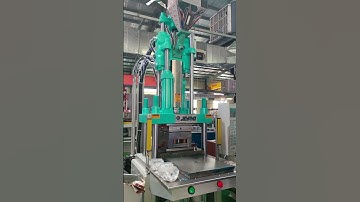 Metal-coated product molding Vertical injection molding machine