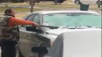FUNNY! Dad uses machete as ice scraper