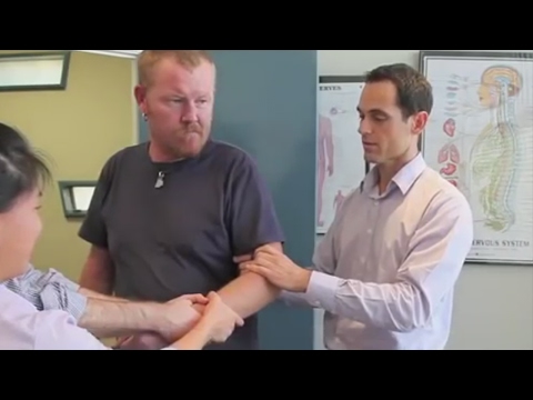 Dr Ian - DISLOCATED ELBOW Adjustment - FIXED by Gonstead Chiropractic