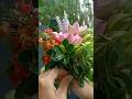 Arranging flowers and foliage into a beautiful display #handicrafts #leafart #flowerart