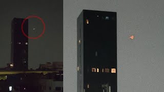 Strange luminous UFO spotted near Buildings, USA, April 2024 👽