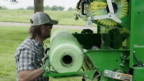 How To Load Net Wrap On A 460M Round Baler | John Deere Tips Notebook