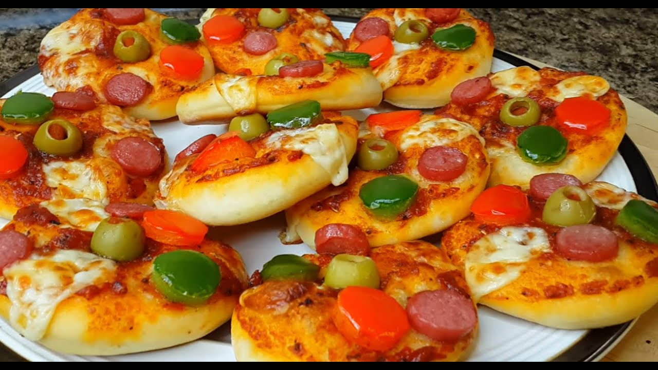 ميني بيتزا 👈.بالعجينه القطنيه .اطيب واسرع عشاء ..مطبخ شاي مهيل