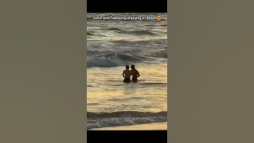 Vmin enjoying at beach😍Both r trying to pull each other