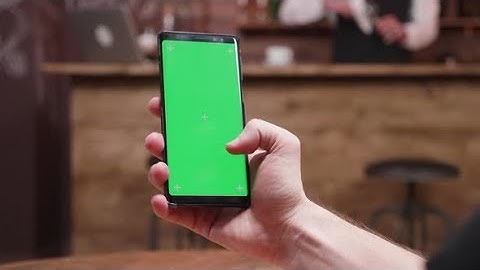 Man Scrolling on a Phone with Green Screen | Stock Footage - Videohive