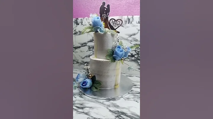 2 tiered Wedding cake.. Congratulations Mr & Mrs. ...