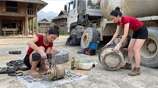 The talented girl repairs and restores truck tires.