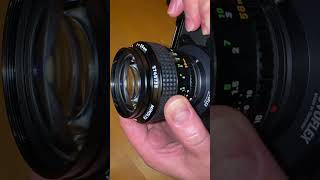 Minolta 58mm f1.2 MC Rokkor - Rubber focusing ring keeps sliding past both stopping points.