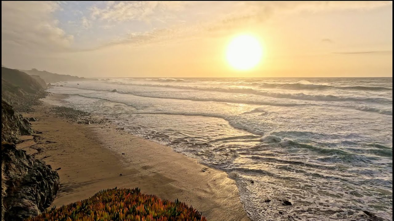 Turbulent Ocean Waves breaking onto Garapata Beach prior to sunset after a stormy day, Big Sur, CA