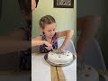 Felicity cutting her fondant birthday cake