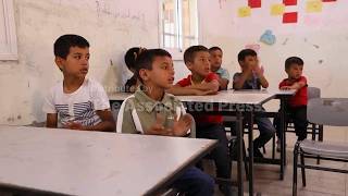 Students and teachers protest against expected Israeli demolition of their school