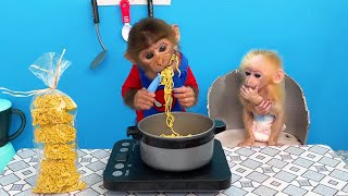 Monkey Bu Bu cooks delicious packages for baby monkey Obi