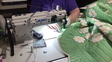 Binding a scalloped edge quilt with the help of a stiletto tutorial.