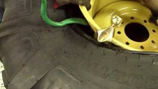 Ken-Tool: 21L-24 Backhoe Tire Being Mounted Using Super Serpent Mounting Tool (#35447)