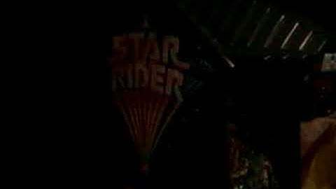 unwrapping a Star Rider Arcade sitdown game
