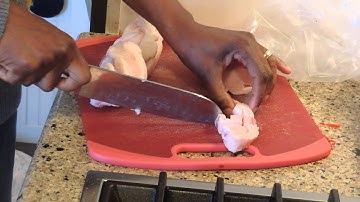 Making lard soap: cutting the pig fat