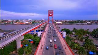 Pesona jembatan ampera, masjid agung, dan sungai musi kota palembang dari mata kamera drone FPV