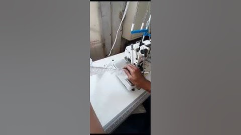 Overlock Machine with Metering Elastic Device