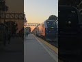 Amtrak 786 arrives in irvine with a amazing sunset and the fifa and SSL cars