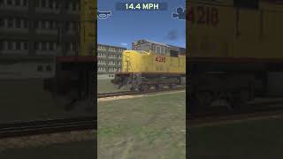 Intermodal de 4 locomotoras saliendo del patio de maniobras.
