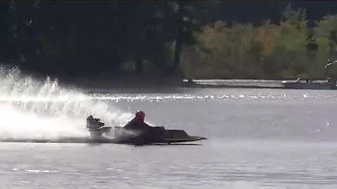 Christine Brewster racing her hydroplane with the ...