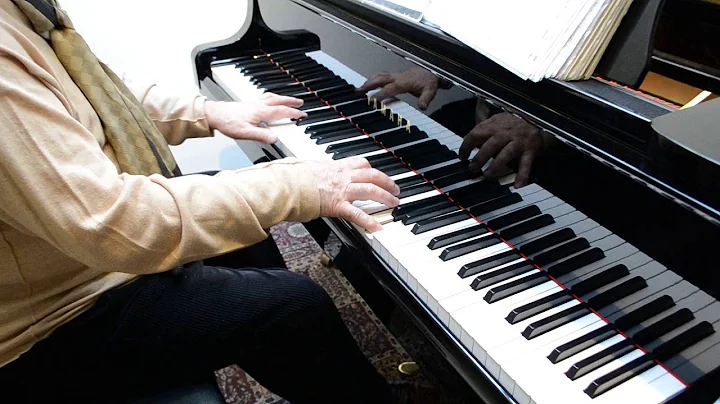 Savu Bobaru Sandule playing the grand piano.