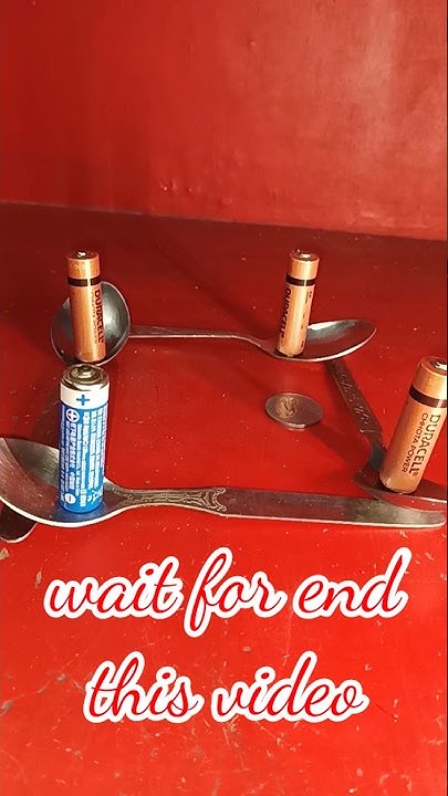 # battery coin and spoon science magic trick experiment#shots#viral#