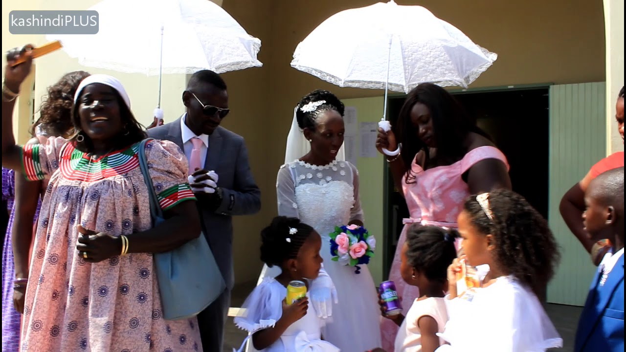 Tate Alpo and Mee Lydia at Okalongo Roman Catholic church