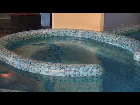 Standing waves in a stadium-shaped pool