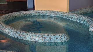 Standing waves in a stadium-shaped pool
