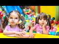 Chloe and meghan playing at the indoor playground for kids