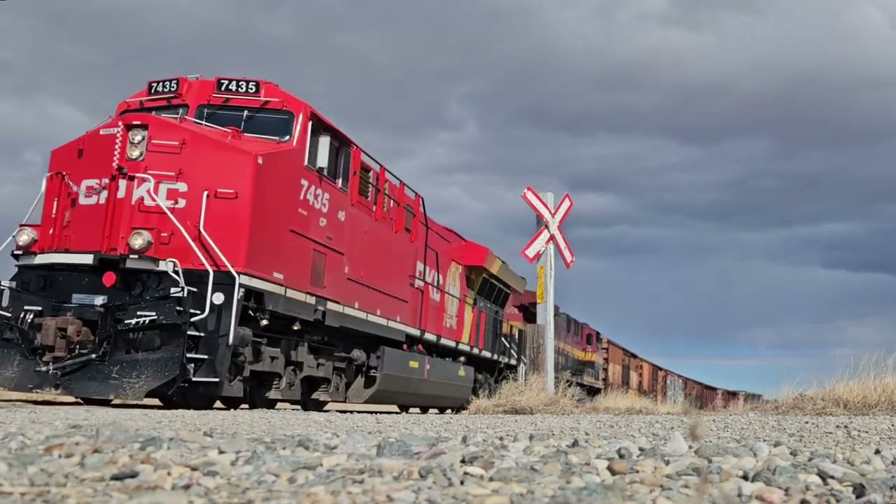 Clean ex-Baffinland CP 7435 leads extra 417 west, with a grey ghost!