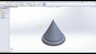 Using the revolve feature Solid Works