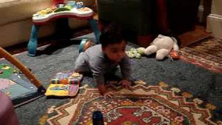 Baby Dylan crawling with belly off the ground - 2/20/2009