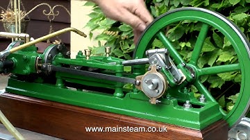 STEAMING THE LARGE GREEN HORIZONTAL STEAM ENGINE IN THE GARDEN