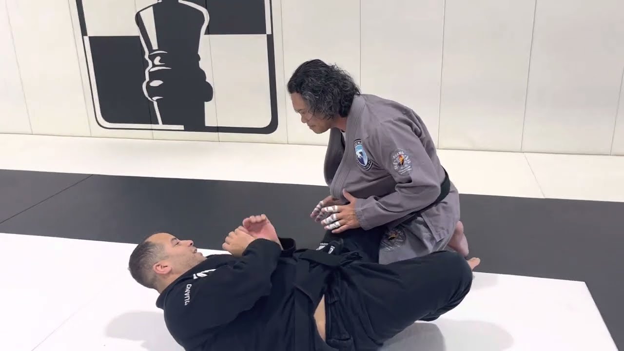 Leonardo Vieira showing a simple half guard sweep.
