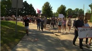 Hundreds gather at candlelight vigil in downtown Raleigh to honor George Floyd