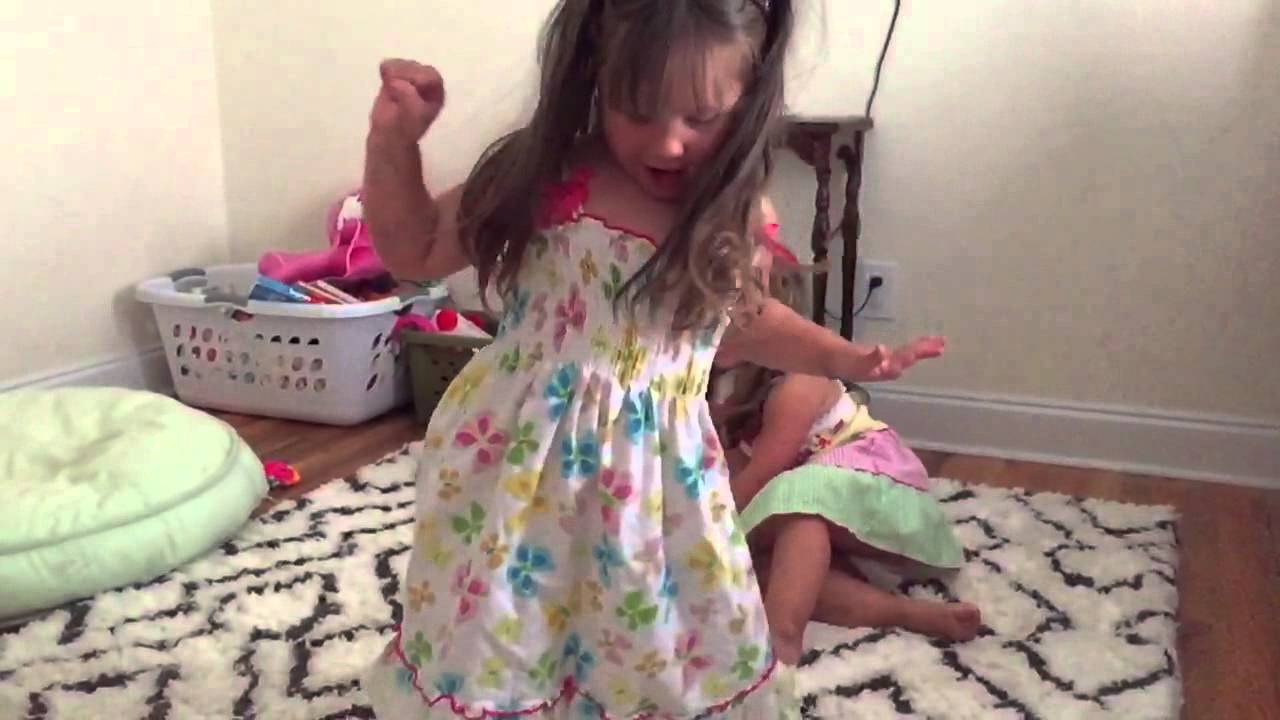 Slo-mo twins in "spinny" dresses - hair flying