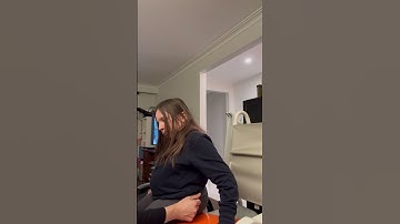 Sliding board from w/c to commode with assistance via pulling on pants at the hip