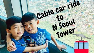#17: Twins riding a cable car to visit #NSeoulTower #17: Twins riding a cable car to visit #NSeoulTower