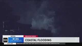 High surf causing coastal flooding in Redondo Beach