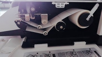 How to installed the label paper for A01 price computing scale with printer