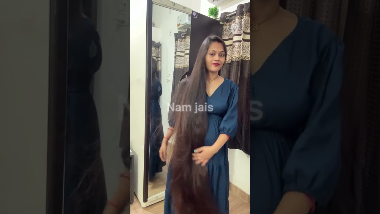 Ms rapunzel showing of her incredible knee length hair long hair play by a girl
