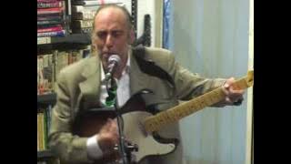 Mick Jones sings 'Should I stay or should I go? at the Rock and Roll Public Library