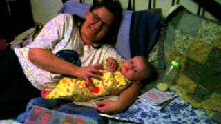 Mommy tickling little Rebekah
