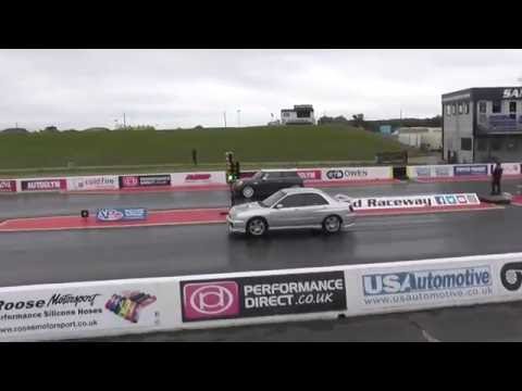 2002-subaru-impreza-wrx-vs-2014-f56-mini-cooper-s---1/4-mile-drag-race