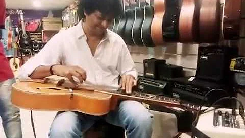 Mohan Veena indian classical guitar playing live a...