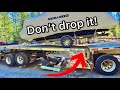 How to get a pontoon boat off a flatbed trailer!