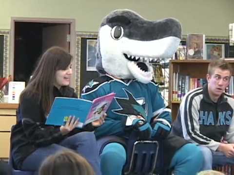 Mascot SJ Sharkie of the San Jose Sharks salutes the crowd wearing